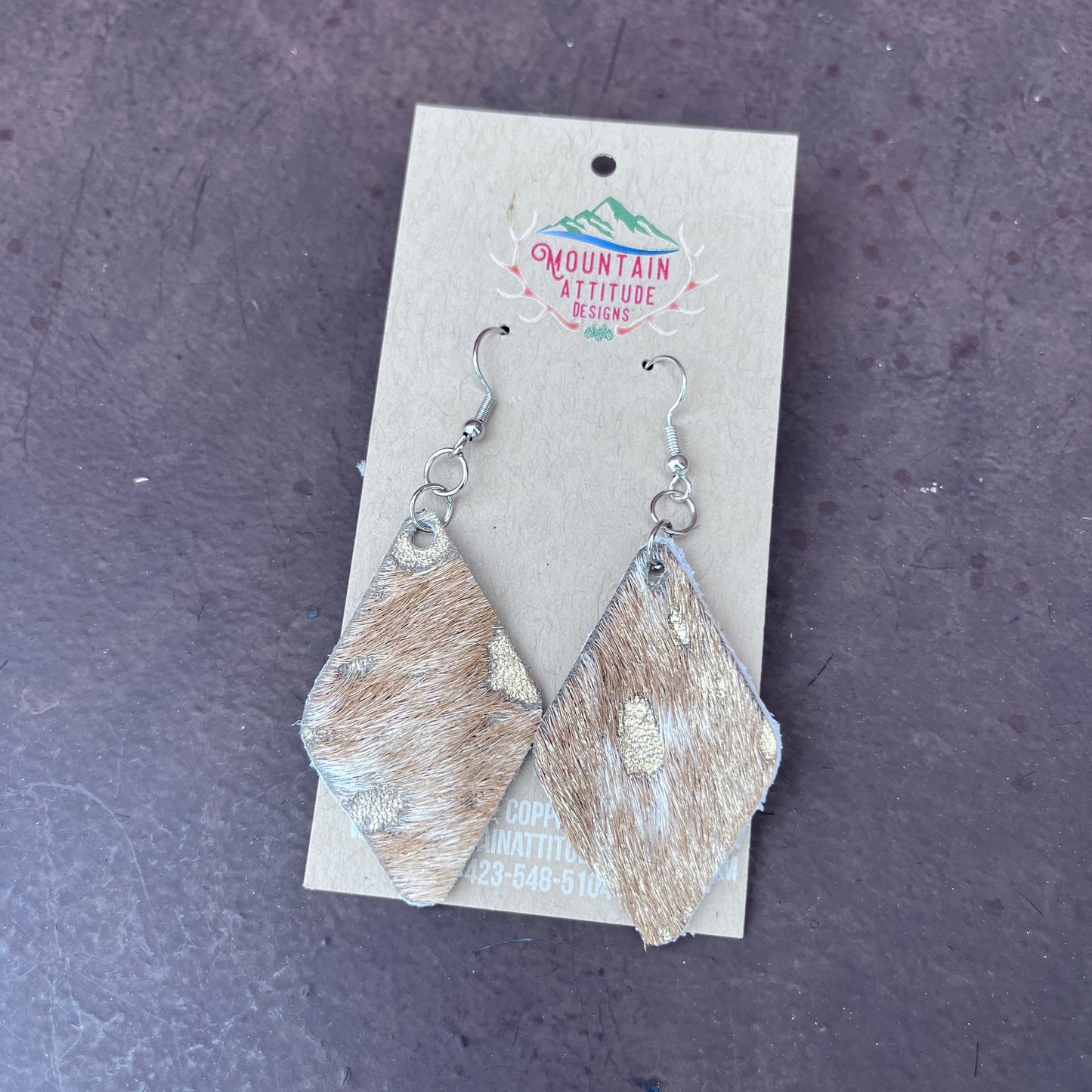 “DALLAS’ HANDMADE COWHIDE EARRINGS